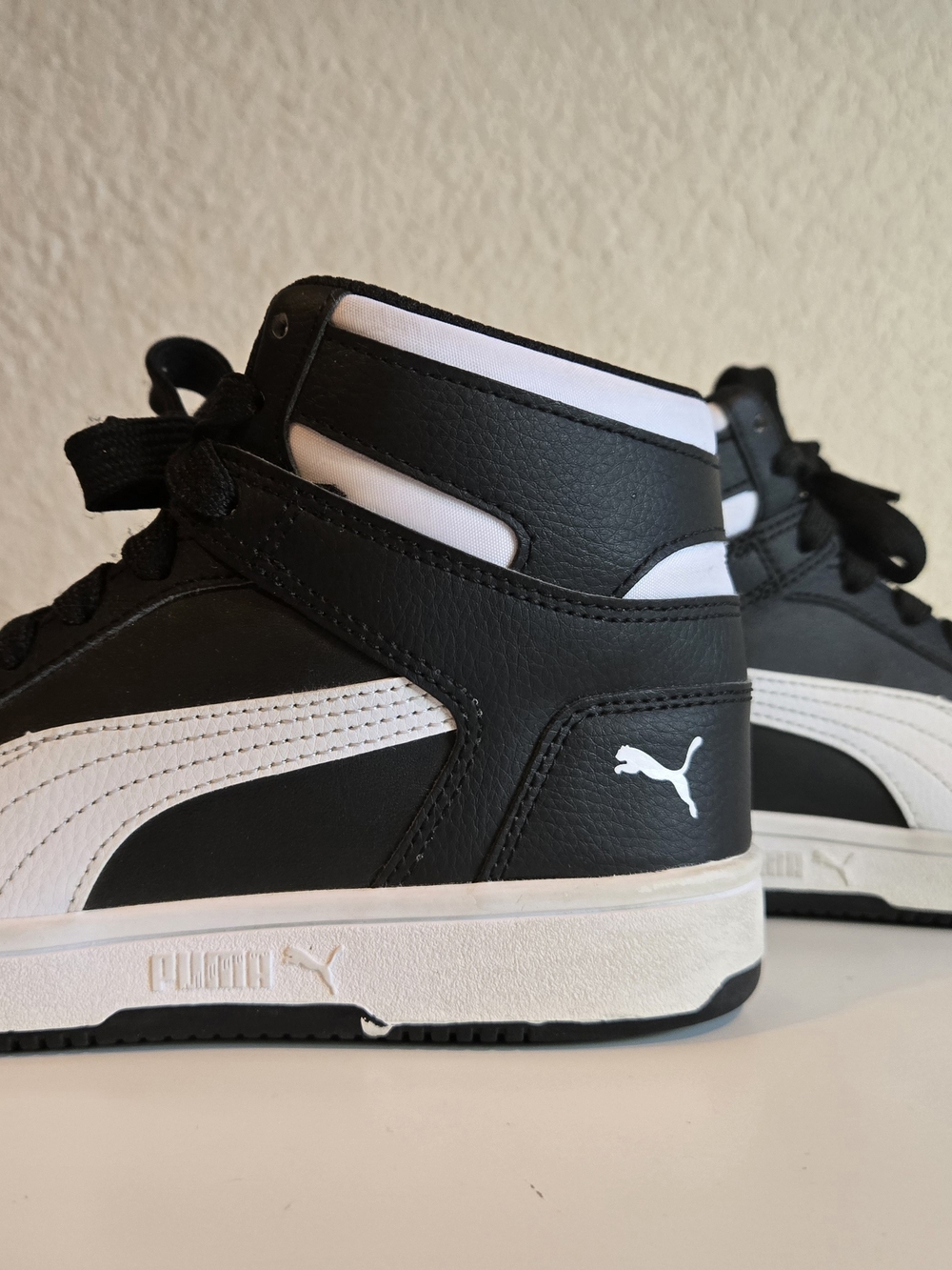 Discontinued Puma rebound lay ups high top boys shoes